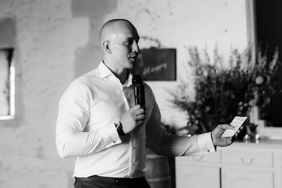 Jonny Pelter speaking on stage